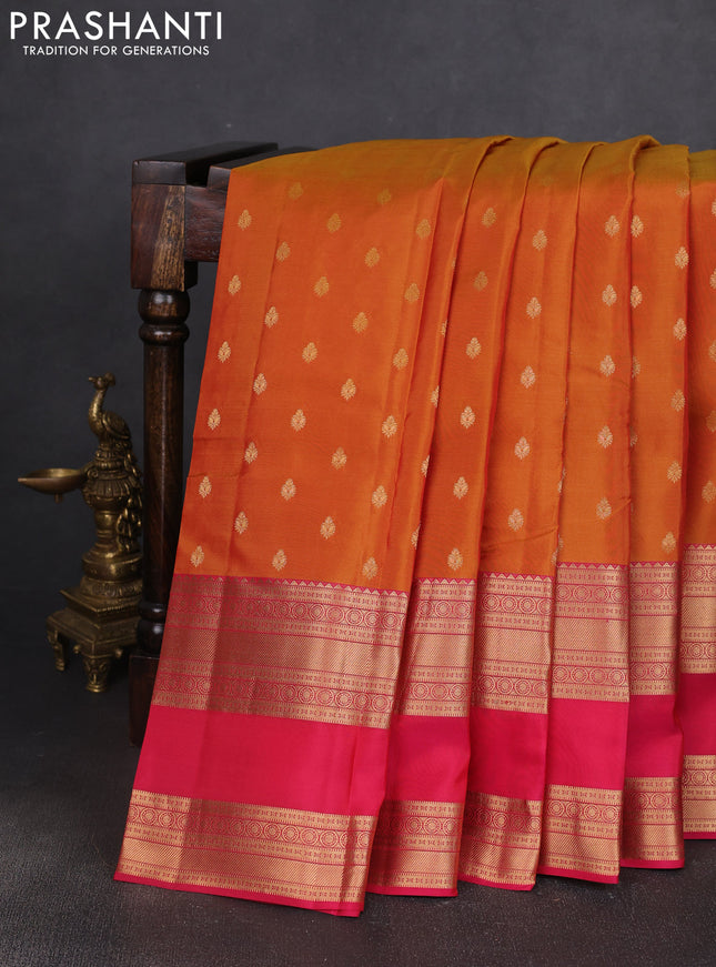 Kanchipuram silk saree sunset orange and pink with allover zari woven buttas and long rettapet zari woven border