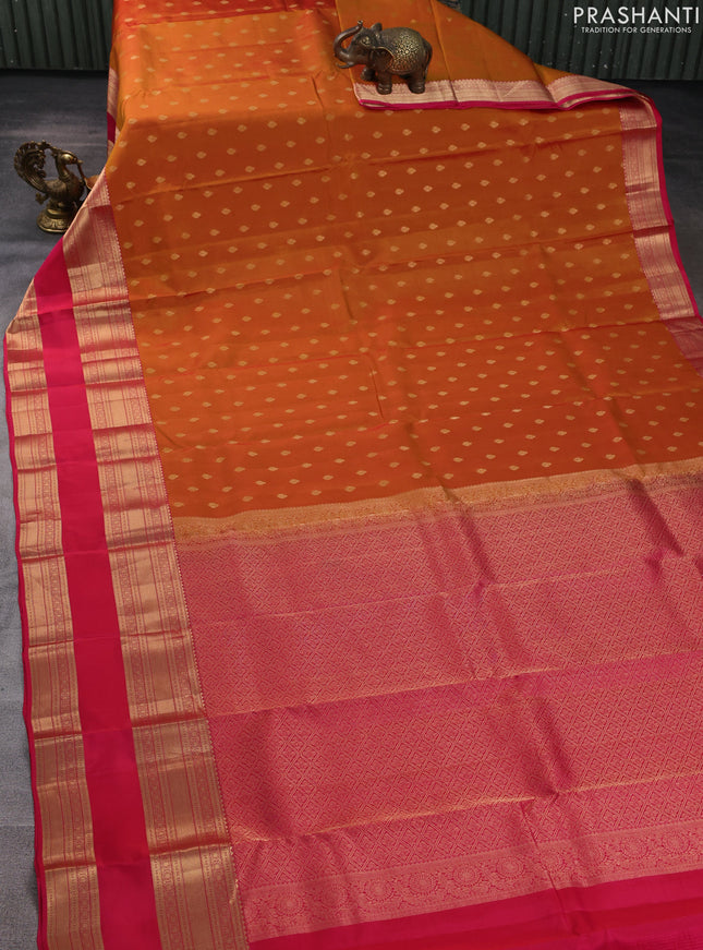 Kanchipuram silk saree sunset orange and pink with allover zari woven buttas and long rettapet zari woven border