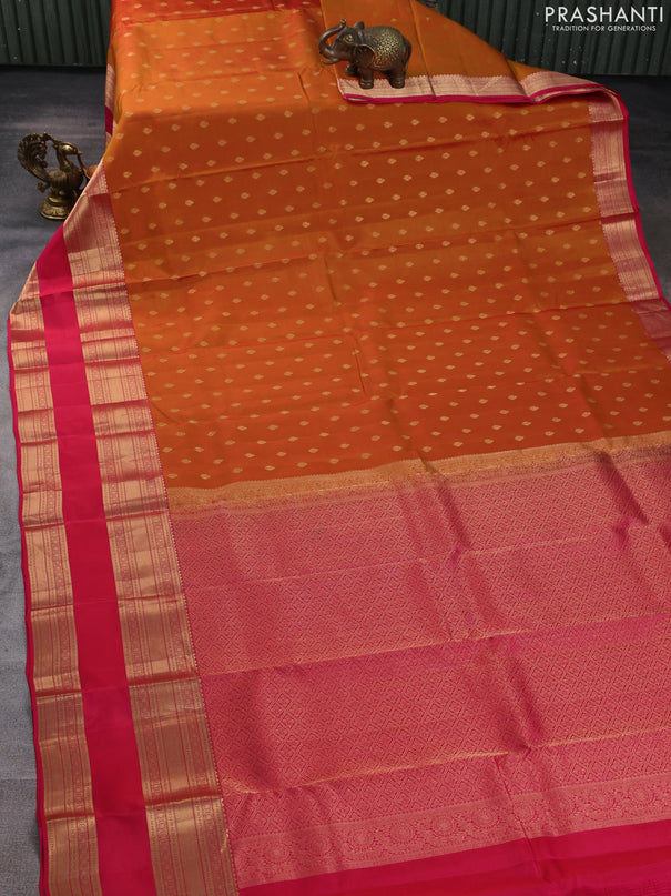 Kanchipuram silk saree sunset orange and pink with allover zari woven buttas and long rettapet zari woven border