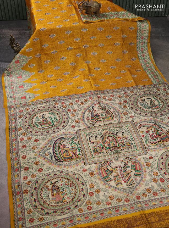 Madhubani printed silk saree mustard yellow and beige with allover warli prints and madhubani printed border