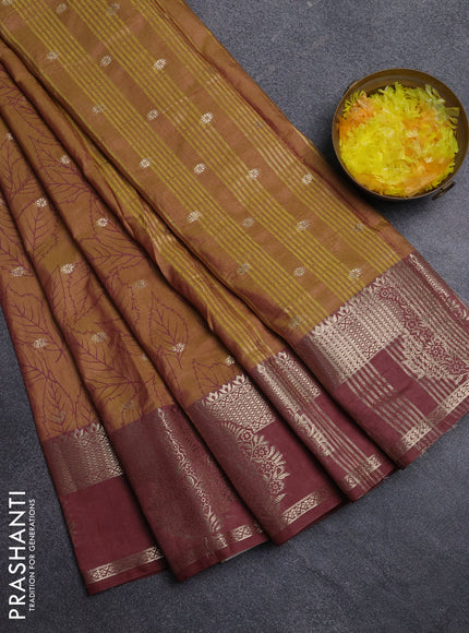 Semi raw silk saree dark mustard green and brown shade with allover prints & 1000 zari buttas and zari woven border