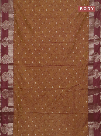 Semi raw silk saree dark mustard green and brown shade with allover prints & 1000 zari buttas and zari woven border