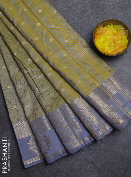 Semi raw silk saree elaichi green and grey with allover prints & 1000 zari buttas and zari woven border