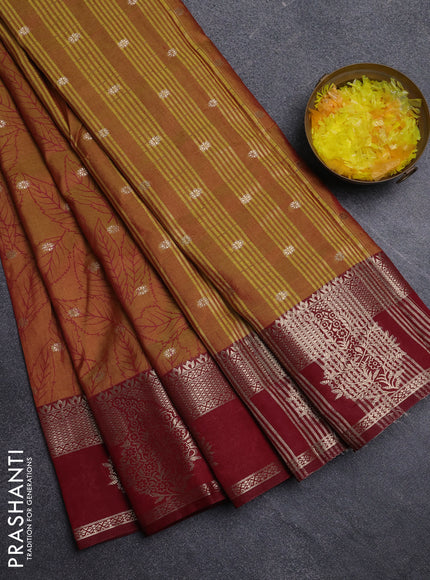 Semi raw silk saree dual shade of dark mustard and maroon with allover prints & 1000 zari buttas and zari woven border