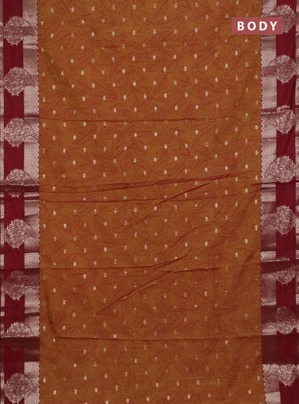 Semi raw silk saree dual shade of dark mustard and maroon with allover prints & 1000 zari buttas and zari woven border