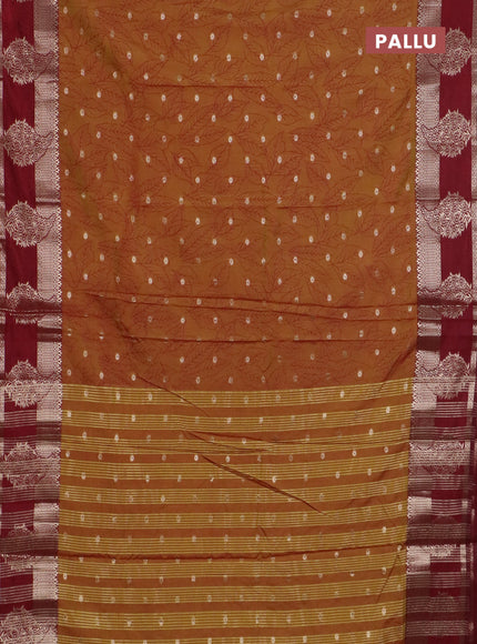 Semi raw silk saree dual shade of dark mustard and maroon with allover prints & 1000 zari buttas and zari woven border