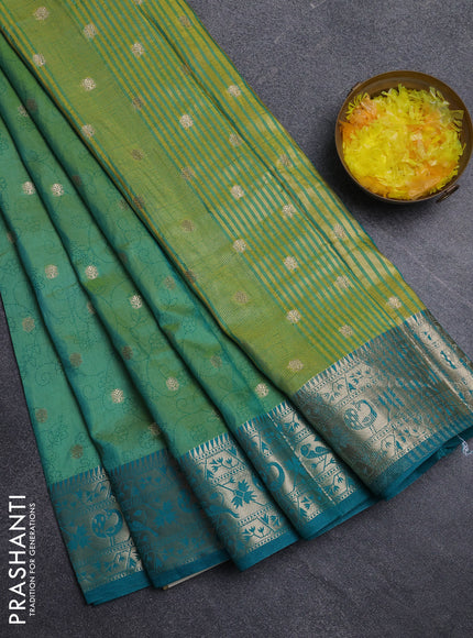 Semi raw silk saree dual shade of light green and teal blue with allover prints & 1000 zari buttas and zari woven border