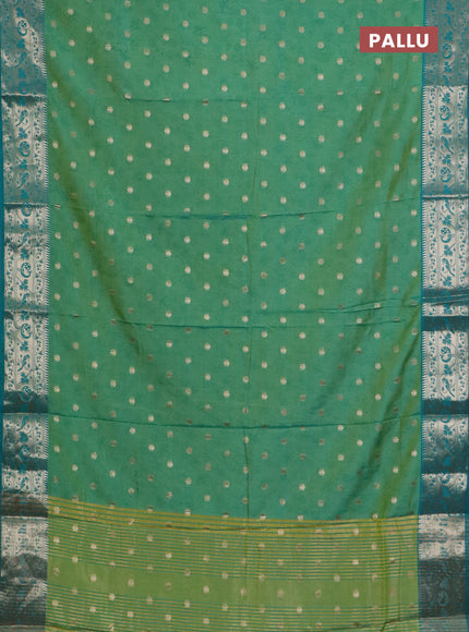 Semi raw silk saree dual shade of light green and teal blue with allover prints & 1000 zari buttas and zari woven border