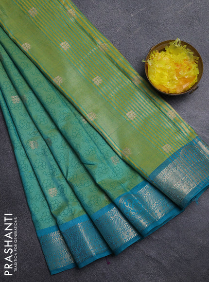 Semi raw silk saree dual shade of teal bluish green and cs blue with allover butta prints & 1000 zari buttas and zari woven border