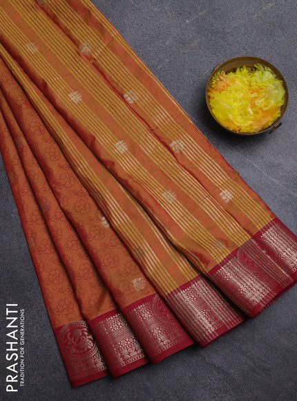 Semi raw silk saree dark mustard and maroon with allover prints & 1000 zari buttas and zari woven border
