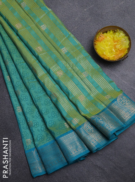 Semi raw silk saree dual shade of teal bluish green and teal blue with allover butta prints & 1000 zari buttas and zari woven border