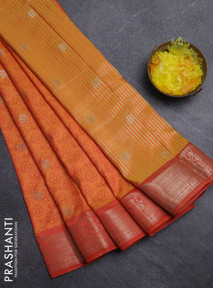 Semi raw silk saree dual shade of orange and red with allover butta prints & 1000 zari buttas and zari woven border