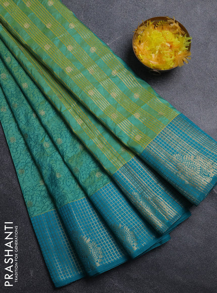 Semi raw silk saree dual shade of teal bluish green and teal green with allover prints & 1000 zari buttas and zari woven border