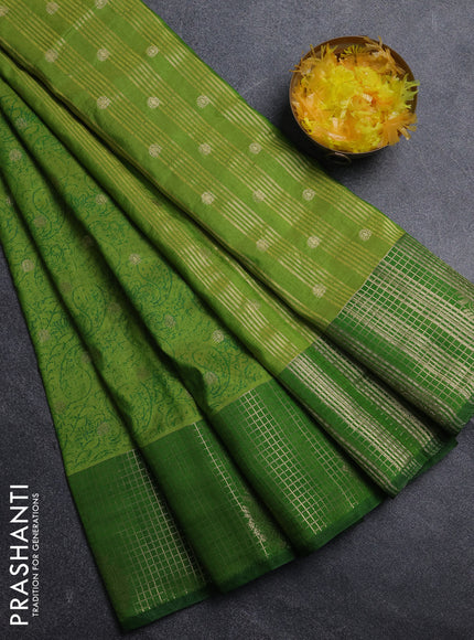Semi raw silk saree light green and green with allover prints & 1000 zari buttas and zari woven border
