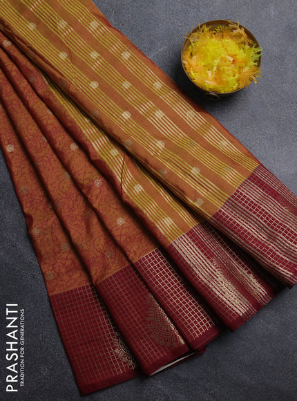 Semi raw silk saree dual shade of dark mustard and maroon with allover prints & 1000 zari buttas and zari woven border