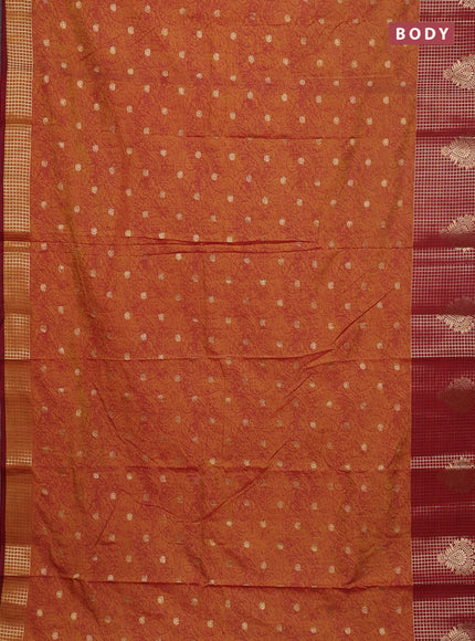 Semi raw silk saree dual shade of dark mustard and maroon with allover prints & 1000 zari buttas and zari woven border