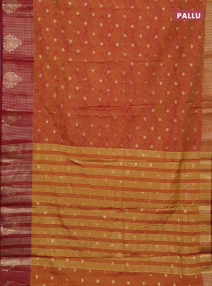 Semi raw silk saree dual shade of dark mustard and maroon with allover prints & 1000 zari buttas and zari woven border