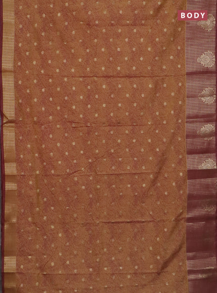 Semi raw silk saree dark mustard and brown with allover prints & 1000 zari buttas and zari woven border