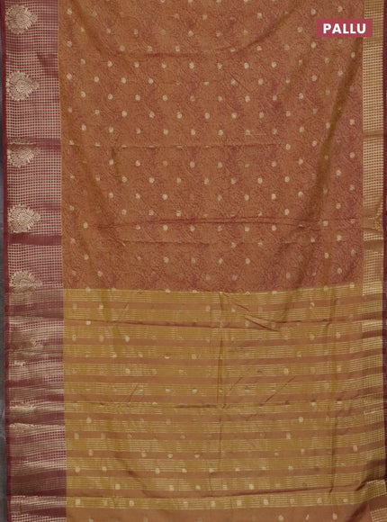 Semi raw silk saree dark mustard and brown with allover prints & 1000 zari buttas and zari woven border