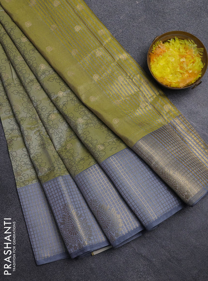 Semi raw silk saree elaichi green and grey with allover kalamkari prints & 1000 zari buttas and zari checked butta border