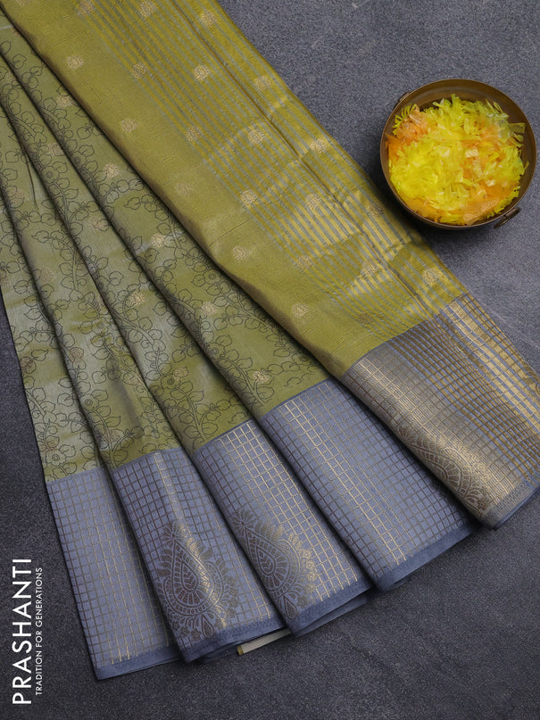 Semi raw silk saree elaichi green and grey with allover kalamkari prints & 1000 zari buttas and zari checked butta border