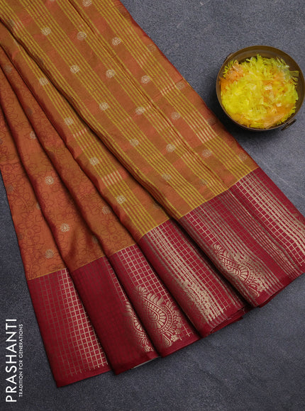 Semi raw silk saree dual shade of dark mustard and maroon with allover kalamkari prints & 1000 zari buttas and zari checked butta border