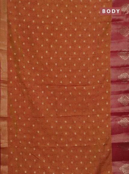 Semi raw silk saree dual shade of dark mustard and maroon with allover kalamkari prints & 1000 zari buttas and zari checked butta border