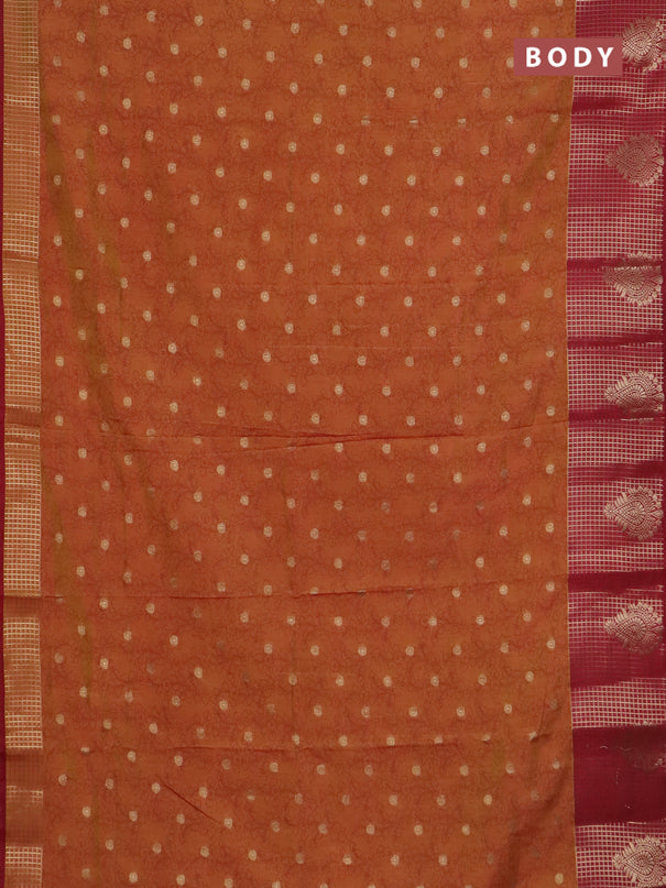 Semi raw silk saree dual shade of dark mustard and maroon with allover kalamkari prints & 1000 zari buttas and zari checked butta border