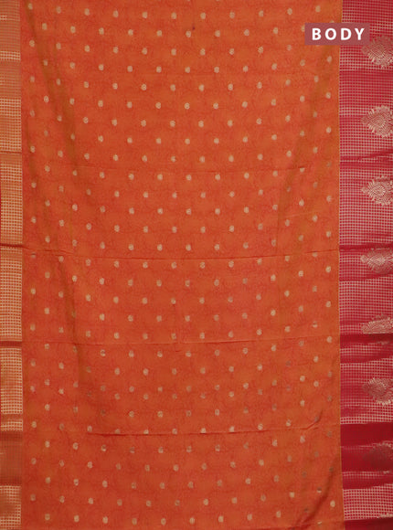 Semi raw silk saree dual shade of orange and red with allover kalamkari prints & 1000 zari buttas and zari checked butta border