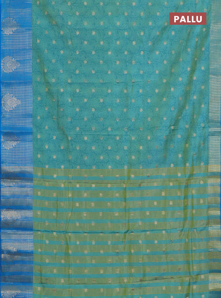 Semi raw silk saree dual shade of teal bluish green and cs blue with allover kalamkari prints & 1000 zari buttas and zari checked butta border