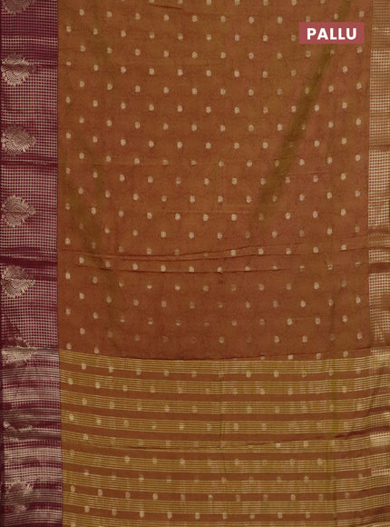 Semi raw silk saree dual shade of dark mustard green and wine shade with allover kalamkari prints & 1000 zari buttas and zari checked butta border