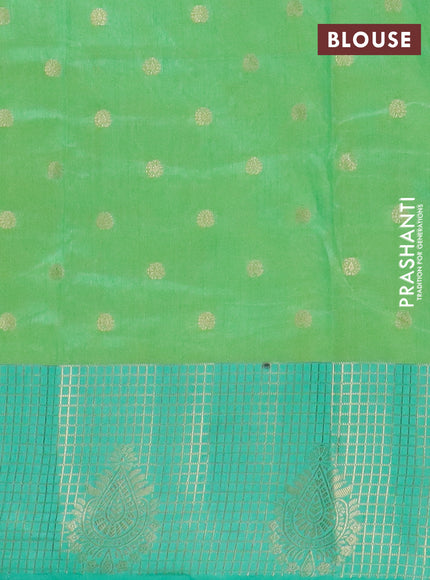 Semi raw silk saree dual shade of light green and teal green with allover kalamkari prints & 1000 zari buttas and zari checked butta border