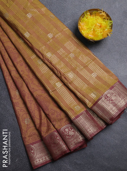 Semi raw silk saree dark mustard and brown with allover prints & 1000 zari buttas and zari woven border