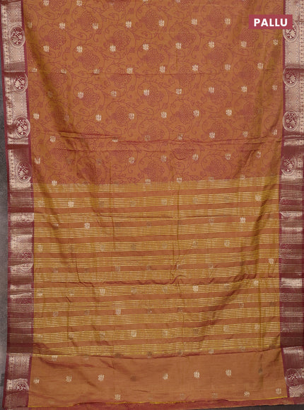 Semi raw silk saree dark mustard and brown with allover prints & 1000 zari buttas and zari woven border