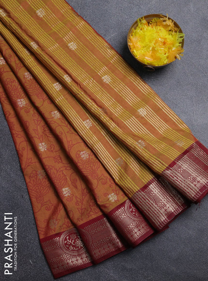 Semi raw silk saree dark mustard and maroon with allover prints & 1000 zari buttas and zari woven border