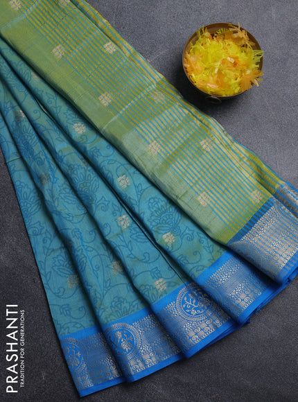 Semi raw silk saree dual shade of teal blue and cs blue with allover prints & 1000 zari buttas and zari woven border