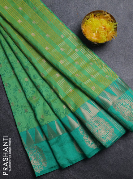 Semi raw silk saree dual shade of light green and teal green with allover prints & 1000 zari buttas and zari woven paisley butta border