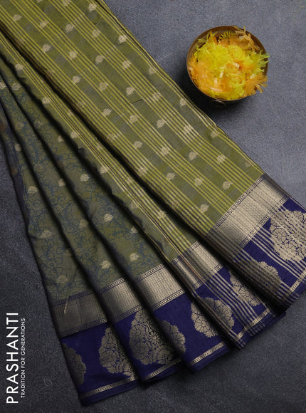 Semi raw silk saree dual shade of green and navy blue with allover kalamkari prints & 1000 zari buttas and zari woven butta border