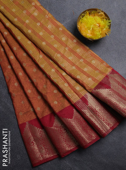 Semi raw silk saree dual shade of dark mustard and maroon with allover kalamkari prints & 1000 zari buttas and temple design zari woven border