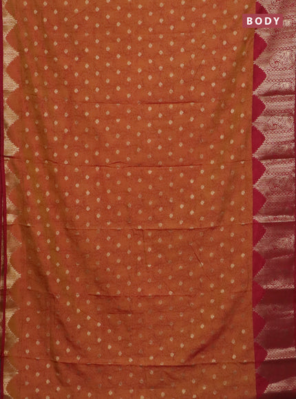 Semi raw silk saree dual shade of dark mustard and maroon with allover kalamkari prints & 1000 zari buttas and temple design zari woven border