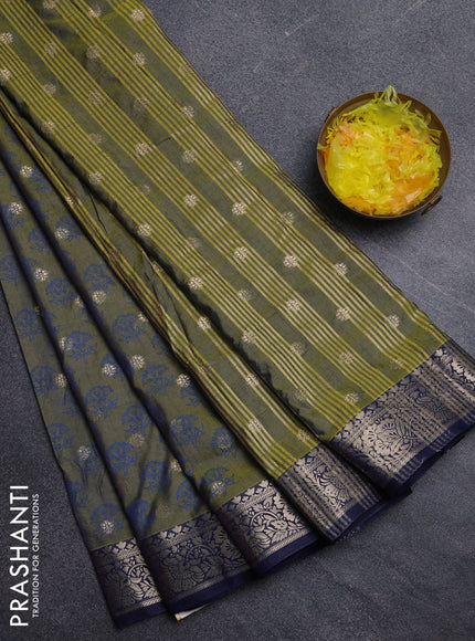 Semi raw silk saree sap green and navy blue with butta prints & 1000 buttas and zari woven border