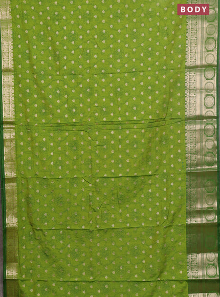 Semi raw silk saree light green and green with allover prints & 1000 zari buttas and zari woven border