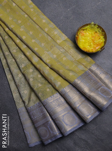 Semi raw silk saree elaichi green and grey with allover prints & 1000 zari buttas and zari woven border