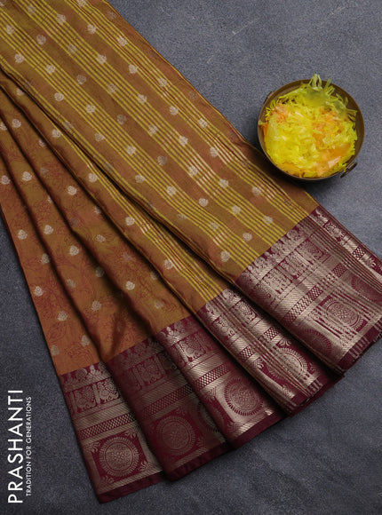 Semi raw silk saree dark mustard and maroon with allover prints & 1000 zari buttas and zari woven border