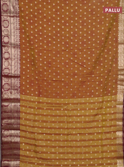 Semi raw silk saree dark mustard and maroon with allover prints & 1000 zari buttas and zari woven border