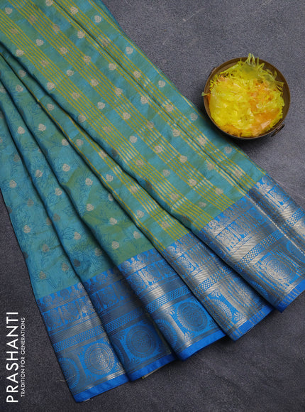 Semi raw silk saree dual shade of teal blue and cs blue with allover prints & 1000 zari buttas and zari woven border