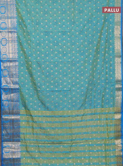 Semi raw silk saree dual shade of teal blue and cs blue with allover prints & 1000 zari buttas and zari woven border