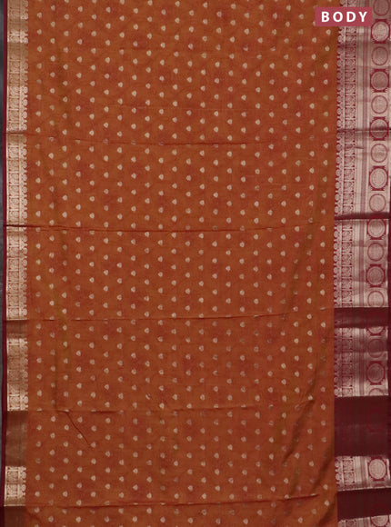 Semi raw silk saree dark mustard and maroon with allover prints & 1000 zari buttas and zari woven border