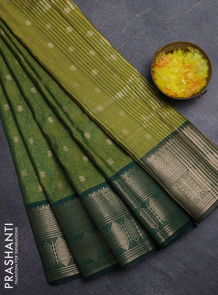 Semi raw silk saree light green and bottle green with allover kalamkari prints & 1000 zari buttas and zari woven border