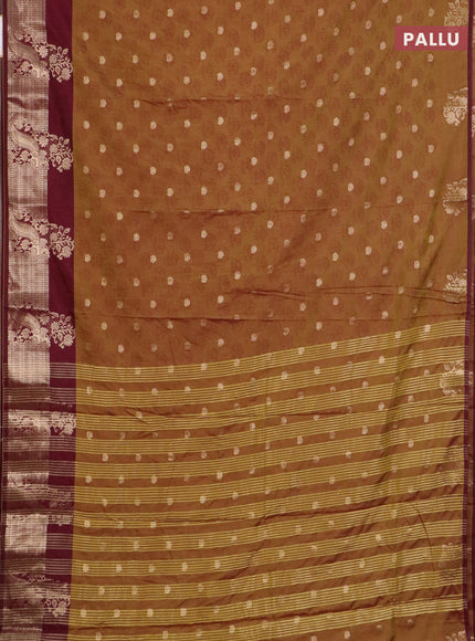 Semi raw silk saree dual shade of dark mustard green and wine shade with allover floral butta prints & 1000 zari buttas and zari woven border